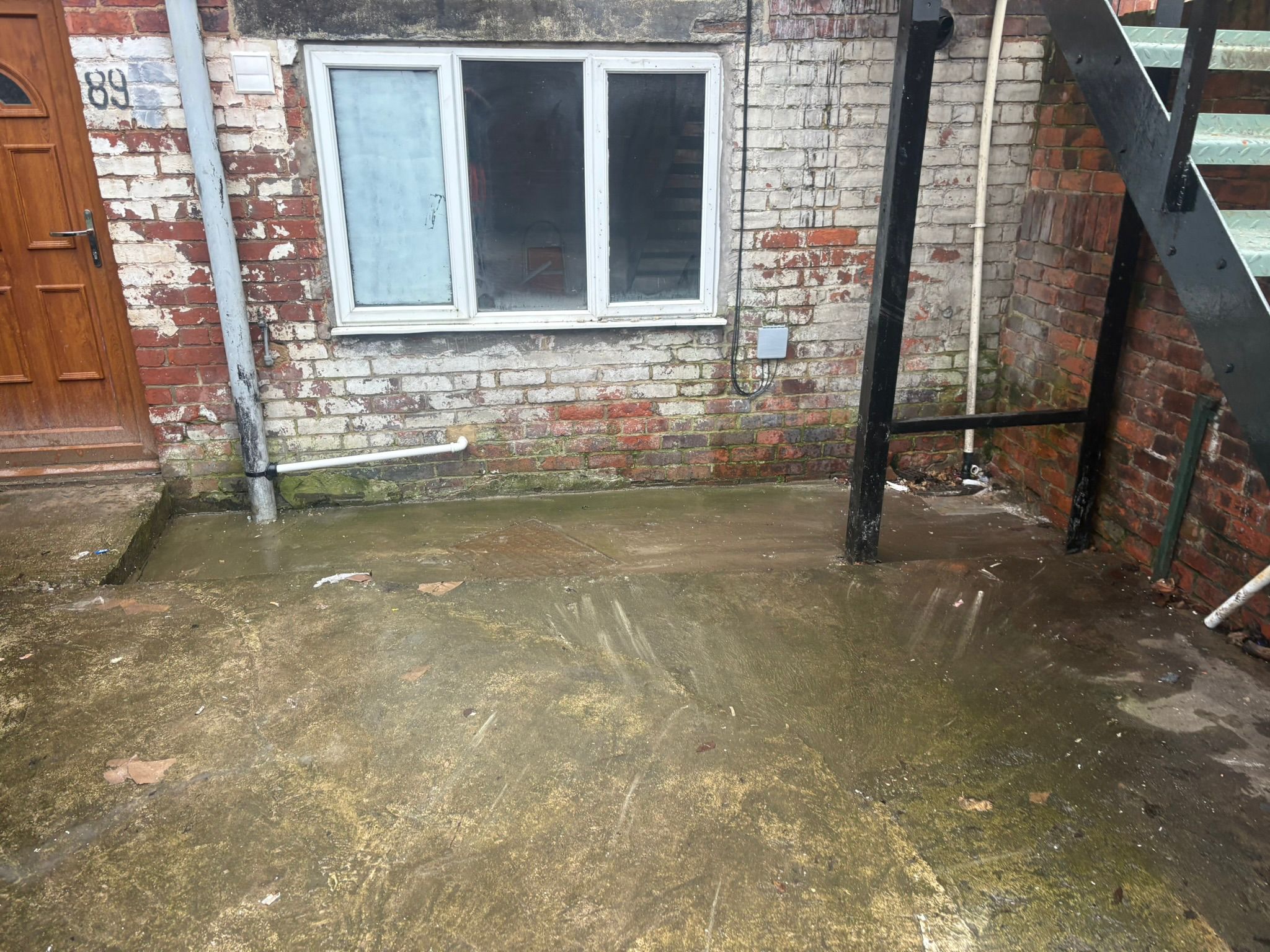 Courtyard area after debris and materials were removed
